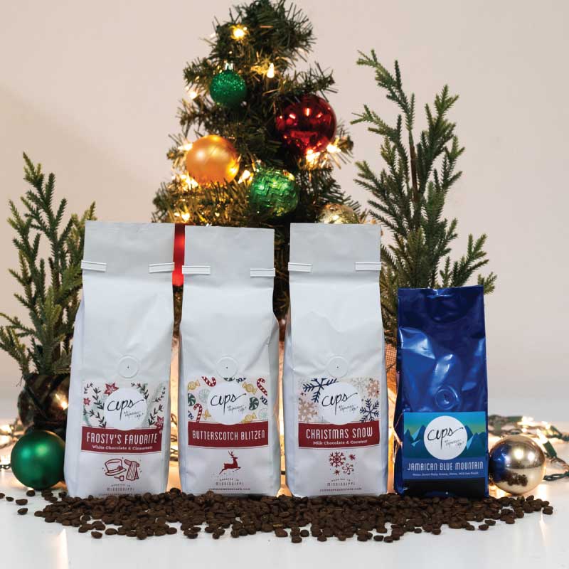 bags of coffee and christmas tree